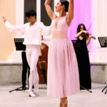 Bailarina de ballet clásico con ambientación tipo candlelight y mil velas, acompañada por trío de cuerda en boda elegante en Madrid.